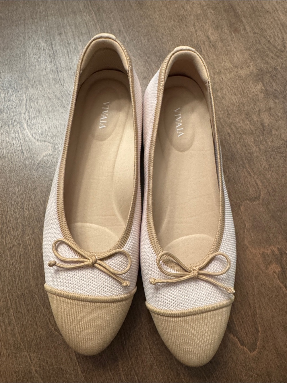 Vivaia Almond-Toe Bow Flats in Cream and Tan